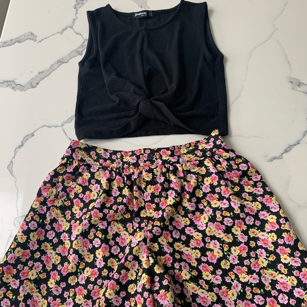 Black cropped tank top and floral shorts